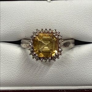 Elegant Sterling Silver and yellow gemstone